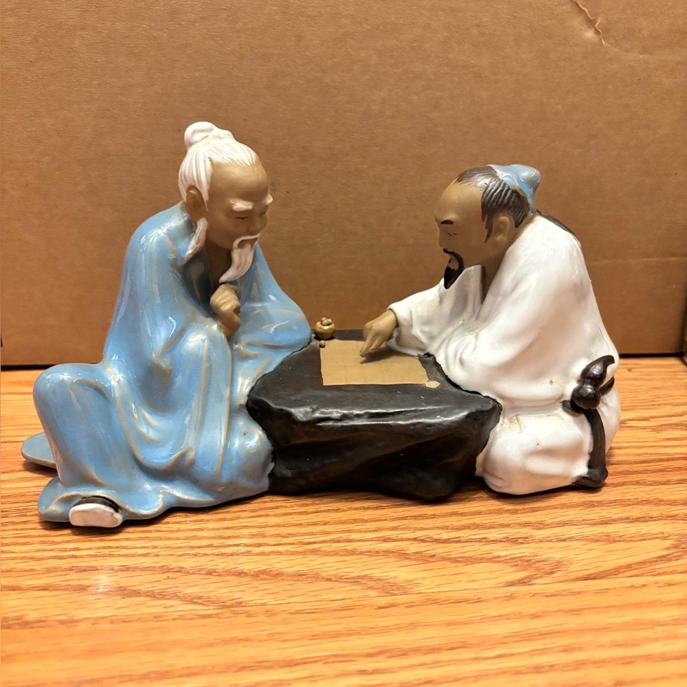 Vintage Chinese ceramic sculpture known as"Mudmen"engaged in a game of Go -Weiqi